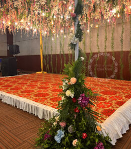 sangeet decoration setup with hanging flowers